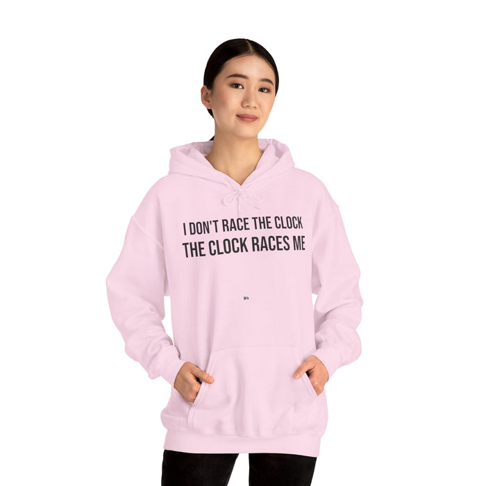 I Don't Race The Clock. The Clock Races Me: Unisex Heavy Blend™ Hooded Sweatshirt