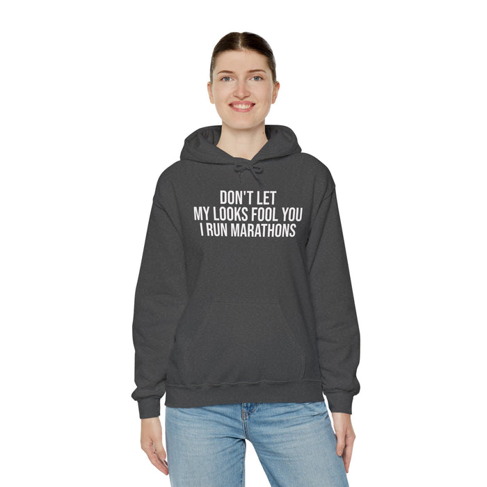 Don't Let My Looks Fool You. I Run Marathons: Unisex Heavy Blend™ Hooded Sweatshirt
