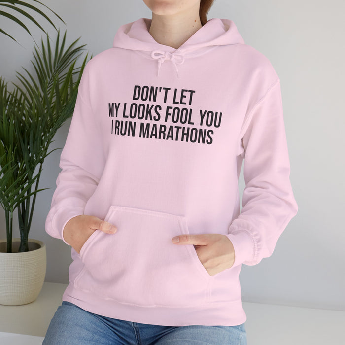 Don't Let My Looks Fool You. I Run Marathons: Unisex Heavy Blend™ Hooded Sweatshirt
