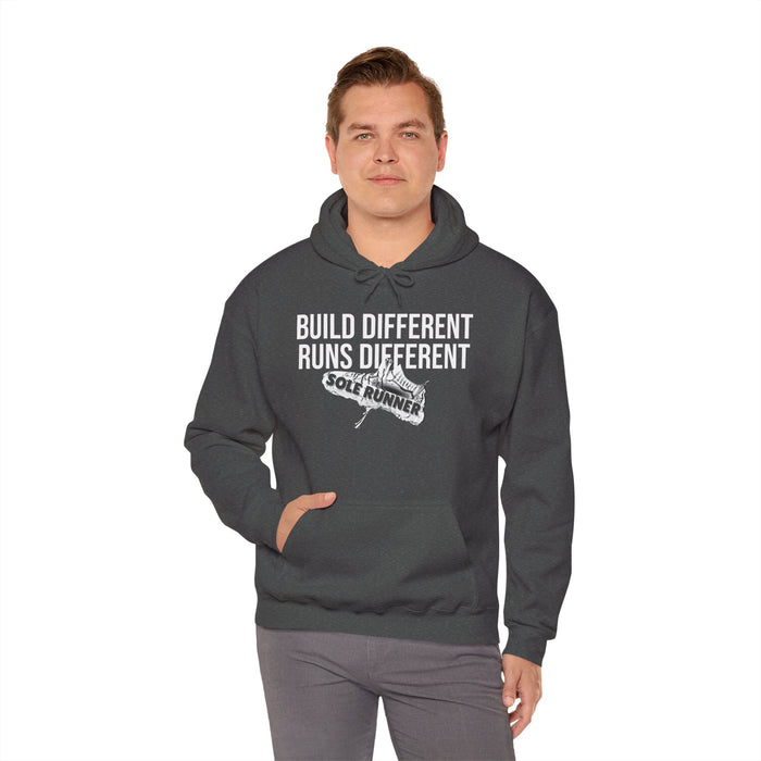 Built Different. Runs Different: Unisex Heavy Blend™ Hooded Sweatshirt