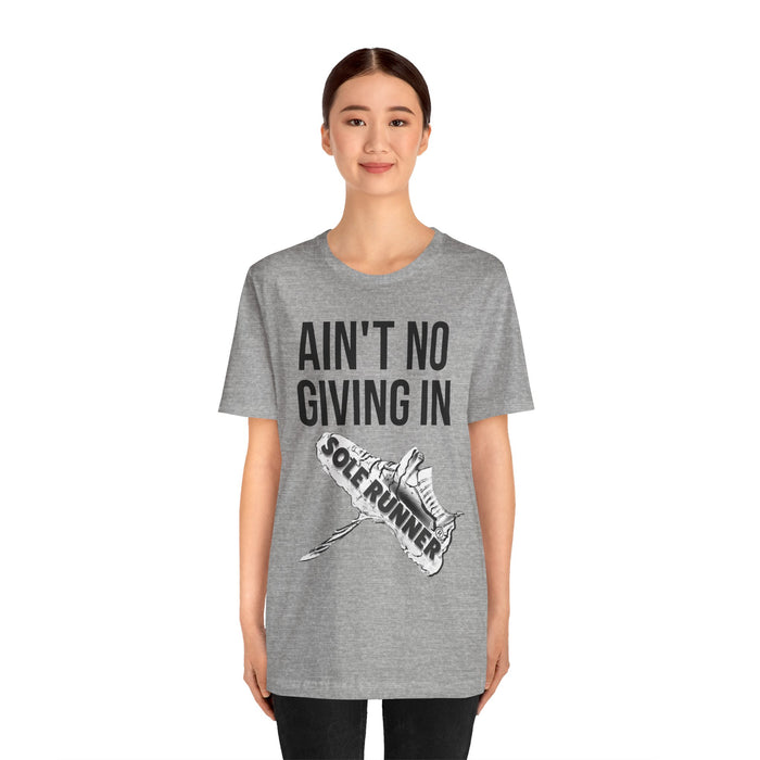 Ain't No Giving In: Unisex Jersey Short Sleeve Tee