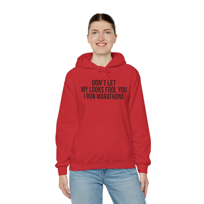Don't Let My Looks Fool You. I Run Marathons: Unisex Heavy Blend™ Hooded Sweatshirt