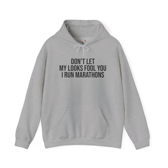 Don't Let My Looks Fool You. I Run Marathons: Unisex Heavy Blend™ Hooded Sweatshirt