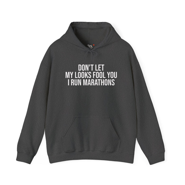 Don't Let My Looks Fool You. I Run Marathons: Unisex Heavy Blend™ Hooded Sweatshirt