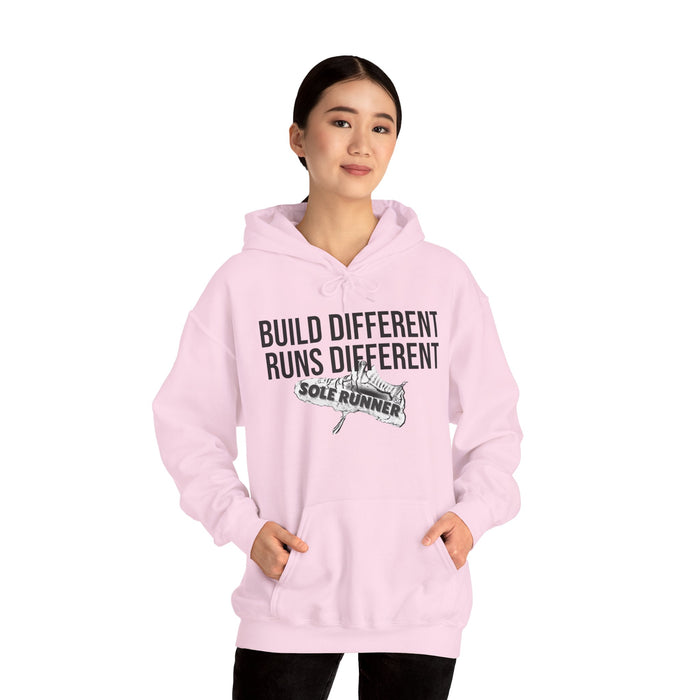 Built Different. Runs Different: Unisex Heavy Blend™ Hooded Sweatshirt