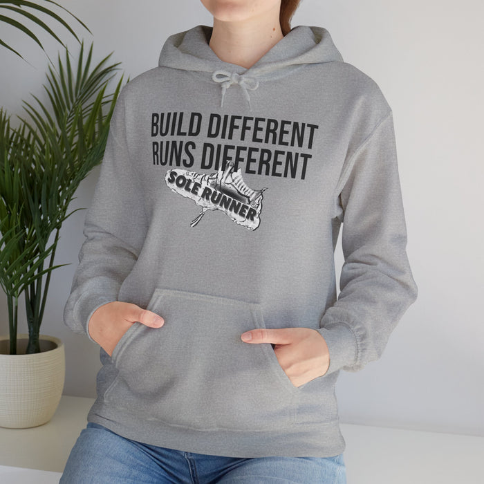 Built Different. Runs Different: Unisex Heavy Blend™ Hooded Sweatshirt