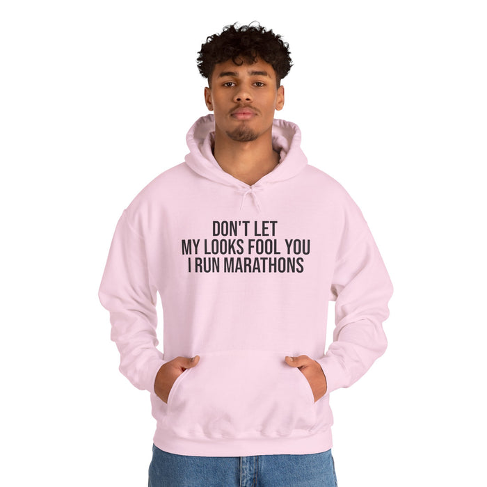 Don't Let My Looks Fool You. I Run Marathons: Unisex Heavy Blend™ Hooded Sweatshirt