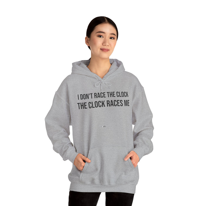 I Don't Race The Clock. The Clock Races Me: Unisex Heavy Blend™ Hooded Sweatshirt