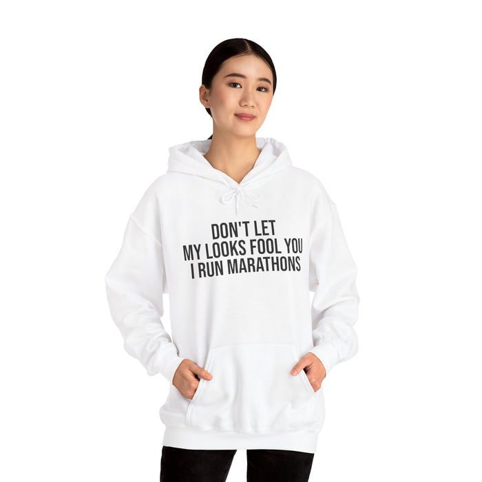 Don't Let My Looks Fool You. I Run Marathons: Unisex Heavy Blend™ Hooded Sweatshirt