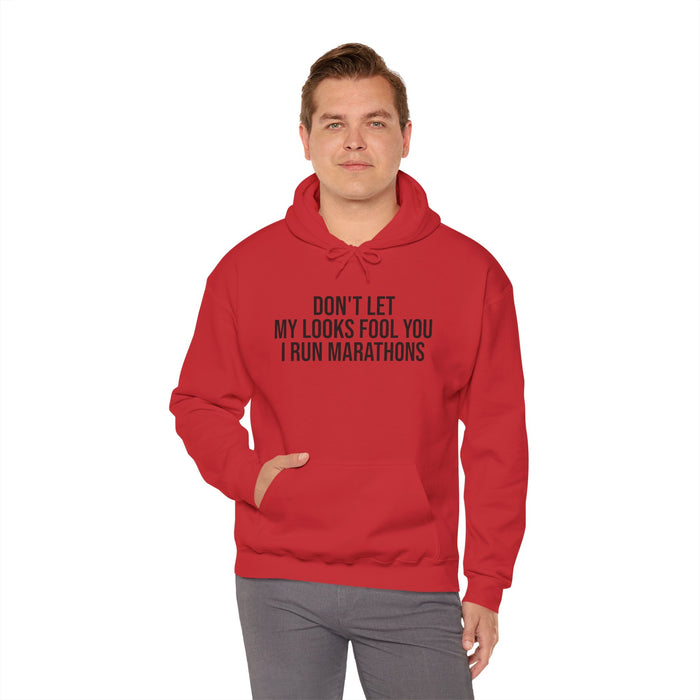 Don't Let My Looks Fool You. I Run Marathons: Unisex Heavy Blend™ Hooded Sweatshirt