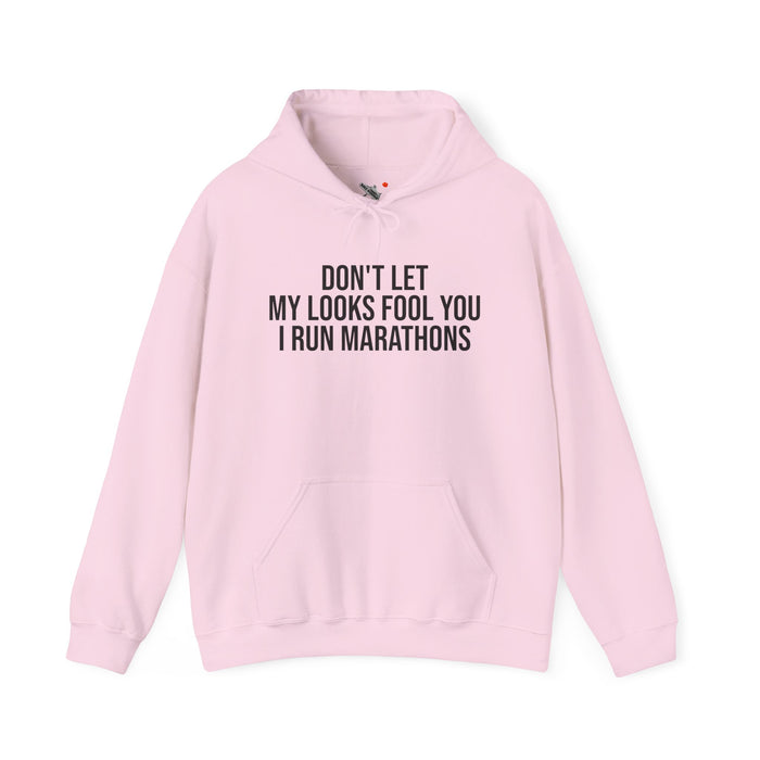 Don't Let My Looks Fool You. I Run Marathons: Unisex Heavy Blend™ Hooded Sweatshirt