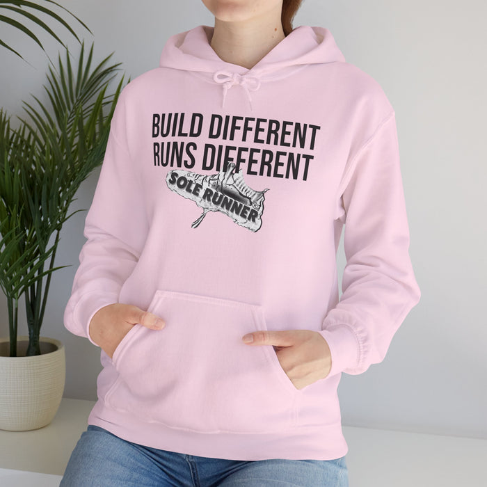 Built Different. Runs Different: Unisex Heavy Blend™ Hooded Sweatshirt