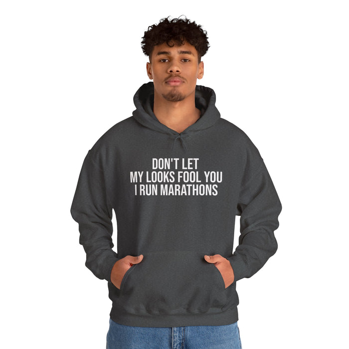 Don't Let My Looks Fool You. I Run Marathons: Unisex Heavy Blend™ Hooded Sweatshirt
