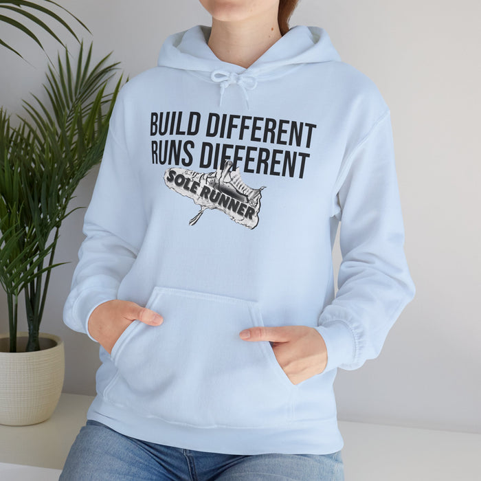 Built Different. Runs Different: Unisex Heavy Blend™ Hooded Sweatshirt
