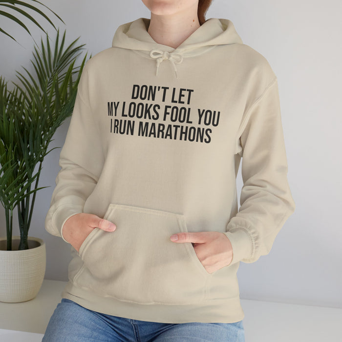 Don't Let My Looks Fool You. I Run Marathons: Unisex Heavy Blend™ Hooded Sweatshirt