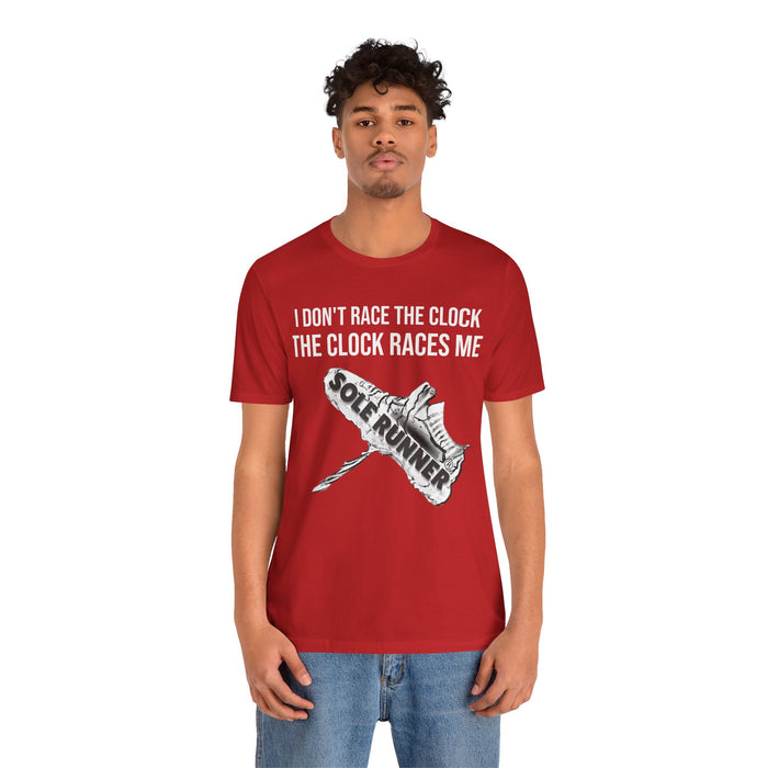 I Don't Race The Clock. The Clock Races Me: Unisex Jersey Short Sleeve Tee