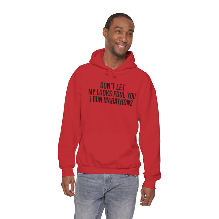 Don't Let My Looks Fool You. I Run Marathons: Unisex Heavy Blend™ Hooded Sweatshirt