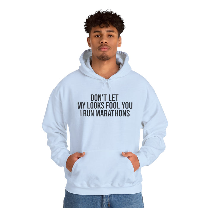 Don't Let My Looks Fool You. I Run Marathons: Unisex Heavy Blend™ Hooded Sweatshirt