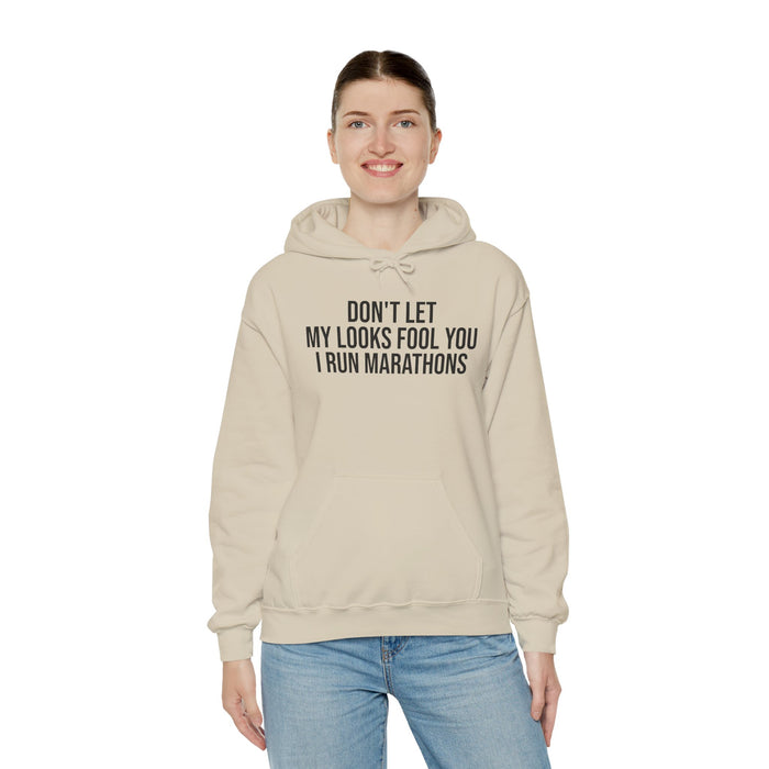 Don't Let My Looks Fool You. I Run Marathons: Unisex Heavy Blend™ Hooded Sweatshirt