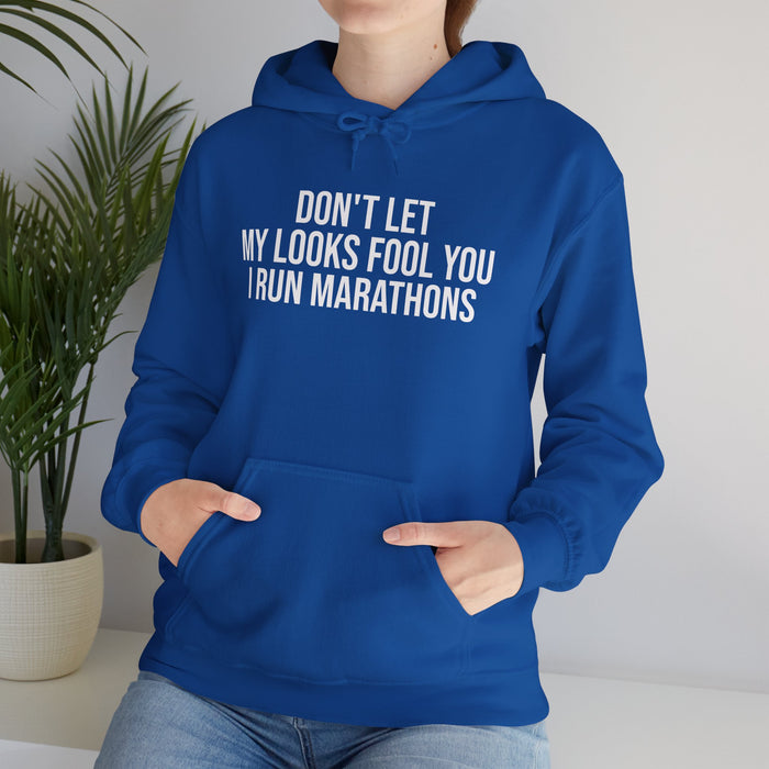 Don't Let My Looks Fool You. I Run Marathons: Unisex Heavy Blend™ Hooded Sweatshirt