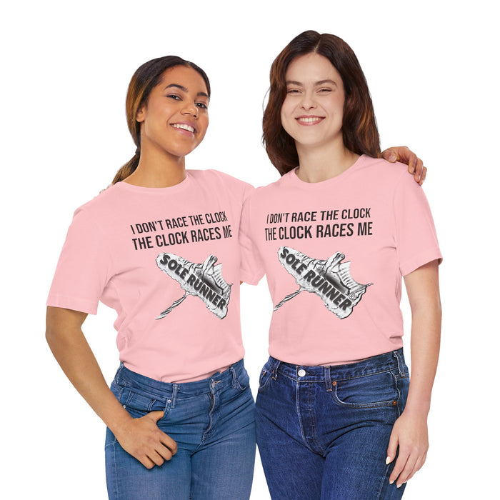 I Don't Race The Clock. The Clock Races Me: Unisex Jersey Short Sleeve Tee