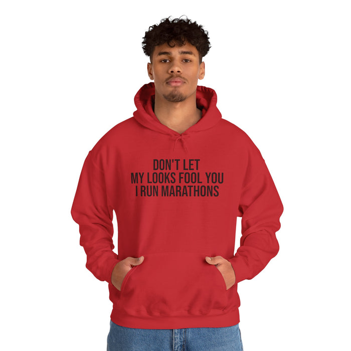 Don't Let My Looks Fool You. I Run Marathons: Unisex Heavy Blend™ Hooded Sweatshirt
