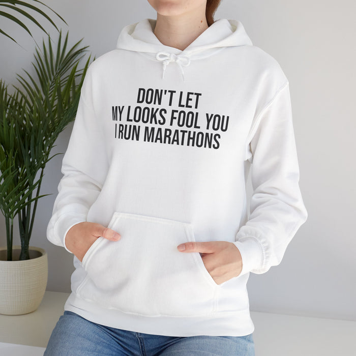 Don't Let My Looks Fool You. I Run Marathons: Unisex Heavy Blend™ Hooded Sweatshirt