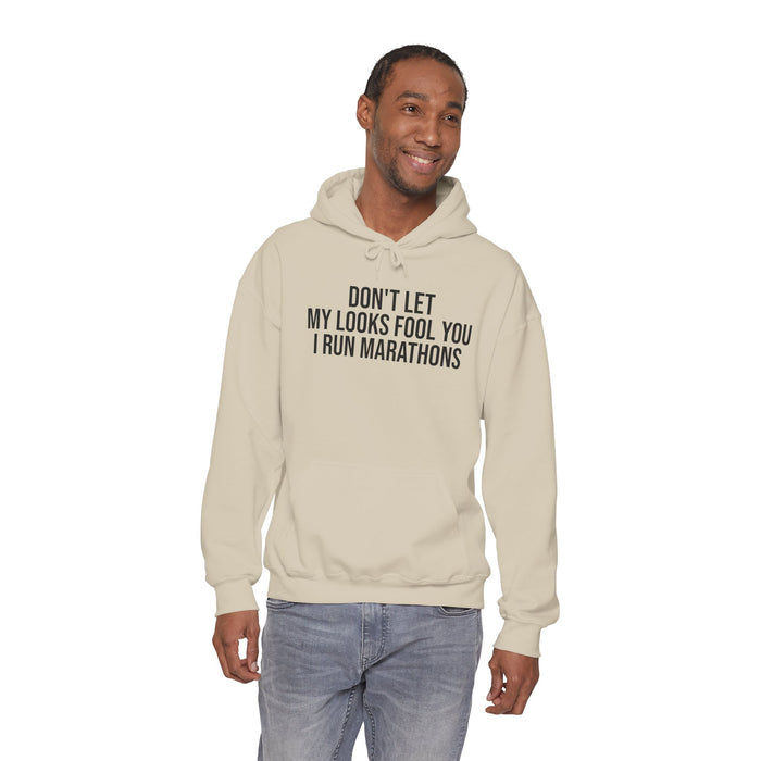 Don't Let My Looks Fool You. I Run Marathons: Unisex Heavy Blend™ Hooded Sweatshirt