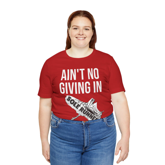 Ain't No Giving In: Unisex Jersey Short Sleeve Tee