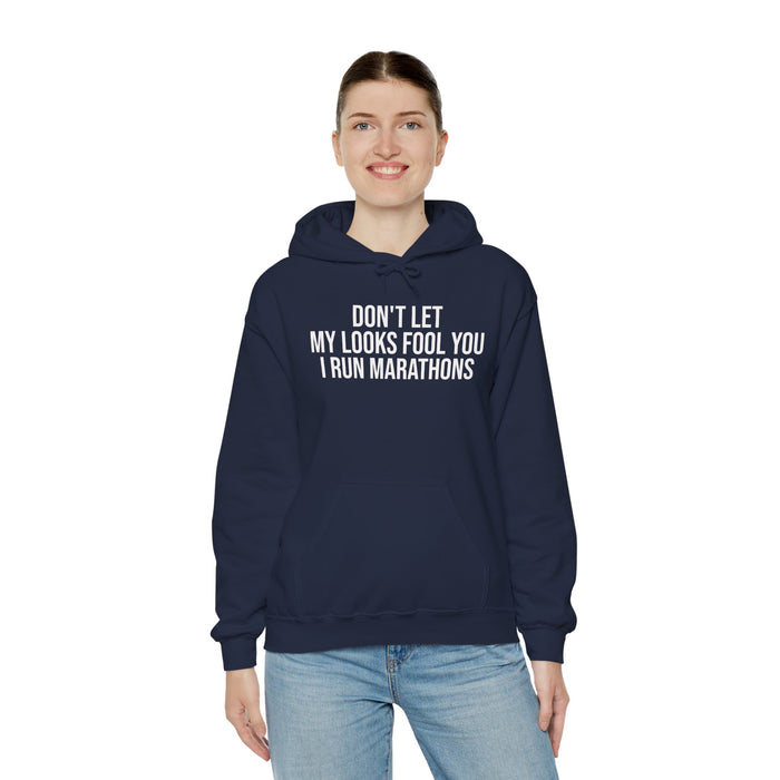 Don't Let My Looks Fool You. I Run Marathons: Unisex Heavy Blend™ Hooded Sweatshirt