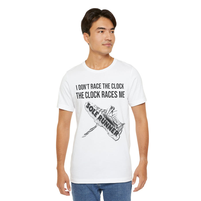 I Don't Race The Clock. The Clock Races Me: Unisex Jersey Short Sleeve Tee