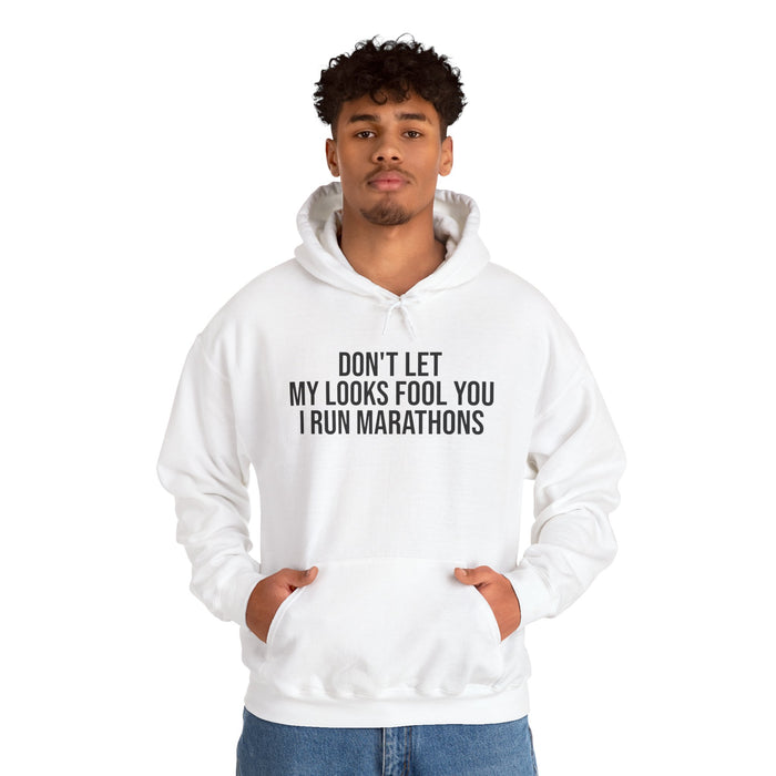 Don't Let My Looks Fool You. I Run Marathons: Unisex Heavy Blend™ Hooded Sweatshirt