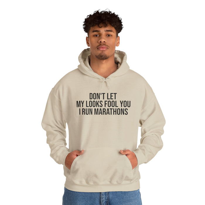 Don't Let My Looks Fool You. I Run Marathons: Unisex Heavy Blend™ Hooded Sweatshirt