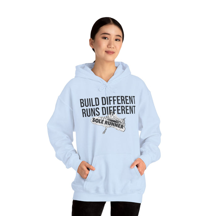 Built Different. Runs Different: Unisex Heavy Blend™ Hooded Sweatshirt