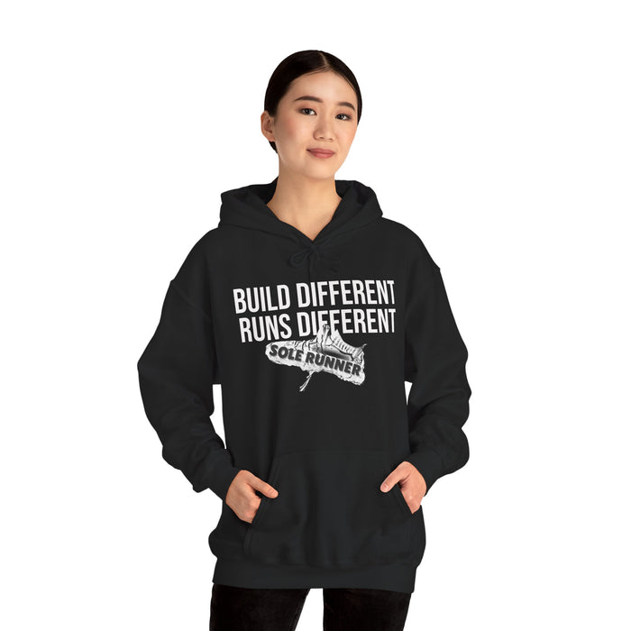 Built Different. Runs Different: Unisex Heavy Blend™ Hooded Sweatshirt