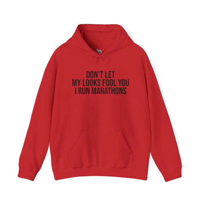 Don't Let My Looks Fool You. I Run Marathons: Unisex Heavy Blend™ Hooded Sweatshirt