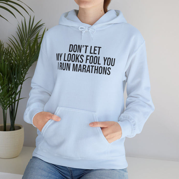 Don't Let My Looks Fool You. I Run Marathons: Unisex Heavy Blend™ Hooded Sweatshirt