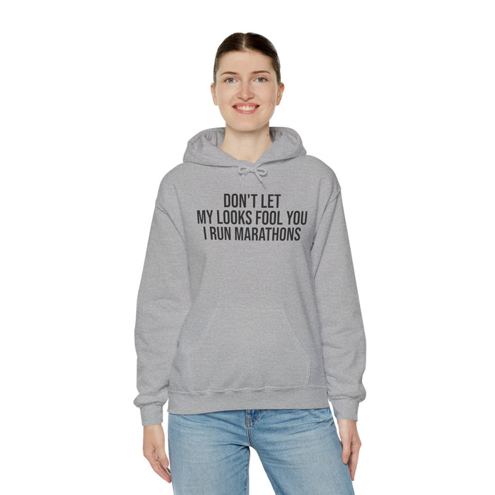 Don't Let My Looks Fool You. I Run Marathons: Unisex Heavy Blend™ Hooded Sweatshirt