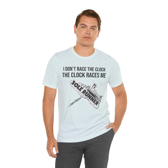 I Don't Race The Clock. The Clock Races Me: Unisex Jersey Short Sleeve Tee