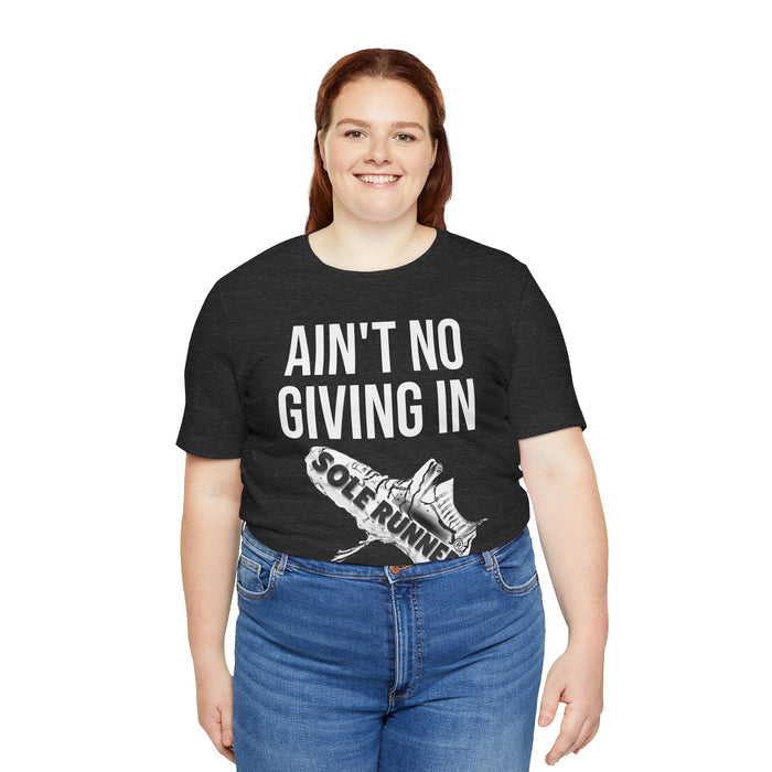 Ain't No Giving In: Unisex Jersey Short Sleeve Tee