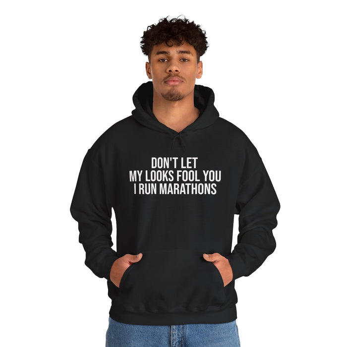 Don't Let My Looks Fool You. I Run Marathons: Unisex Heavy Blend™ Hooded Sweatshirt