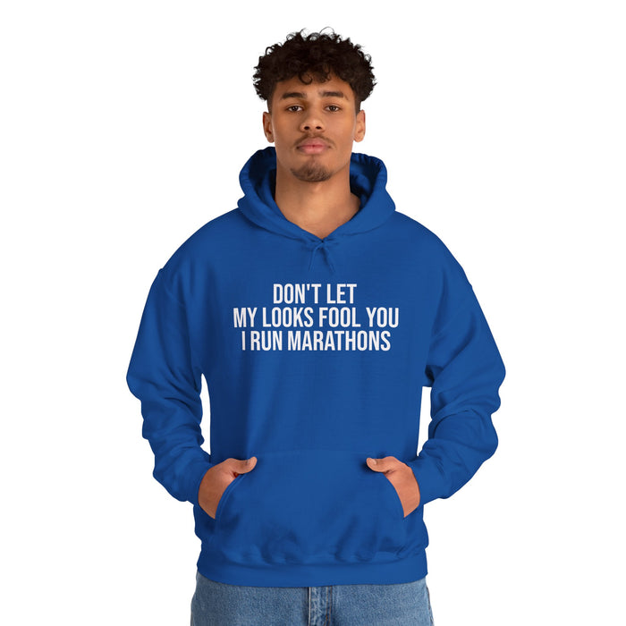 Don't Let My Looks Fool You. I Run Marathons: Unisex Heavy Blend™ Hooded Sweatshirt