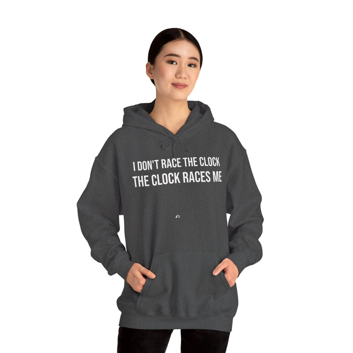 I Don't Race The Clock. The Clock Races Me: Unisex Heavy Blend™ Hooded Sweatshirt