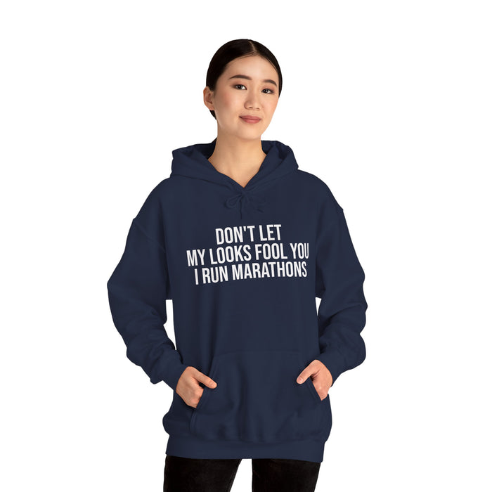 Don't Let My Looks Fool You. I Run Marathons: Unisex Heavy Blend™ Hooded Sweatshirt