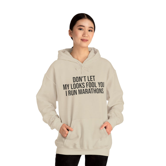 Don't Let My Looks Fool You. I Run Marathons: Unisex Heavy Blend™ Hooded Sweatshirt